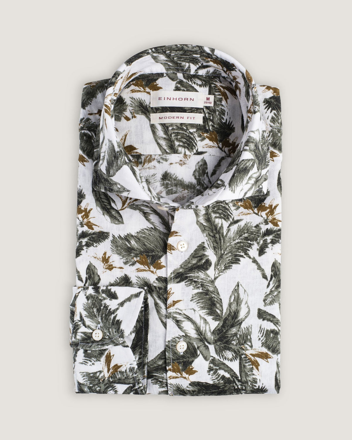 Das Einhorn Hemd Modern Fit Palmendruck Grün verbindet sommerliche Lässigkeit mit eleganter Leichtigkeit.