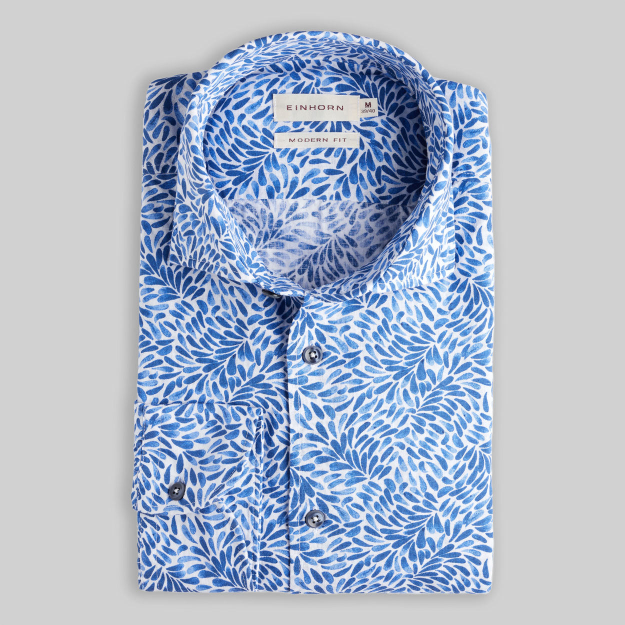 Das Einhorn Leinenbaumwollhemd mit floralem Print Modern Fit Hellblau kombiniert natürliche Materialien mit einem modernen, floralen Design.
