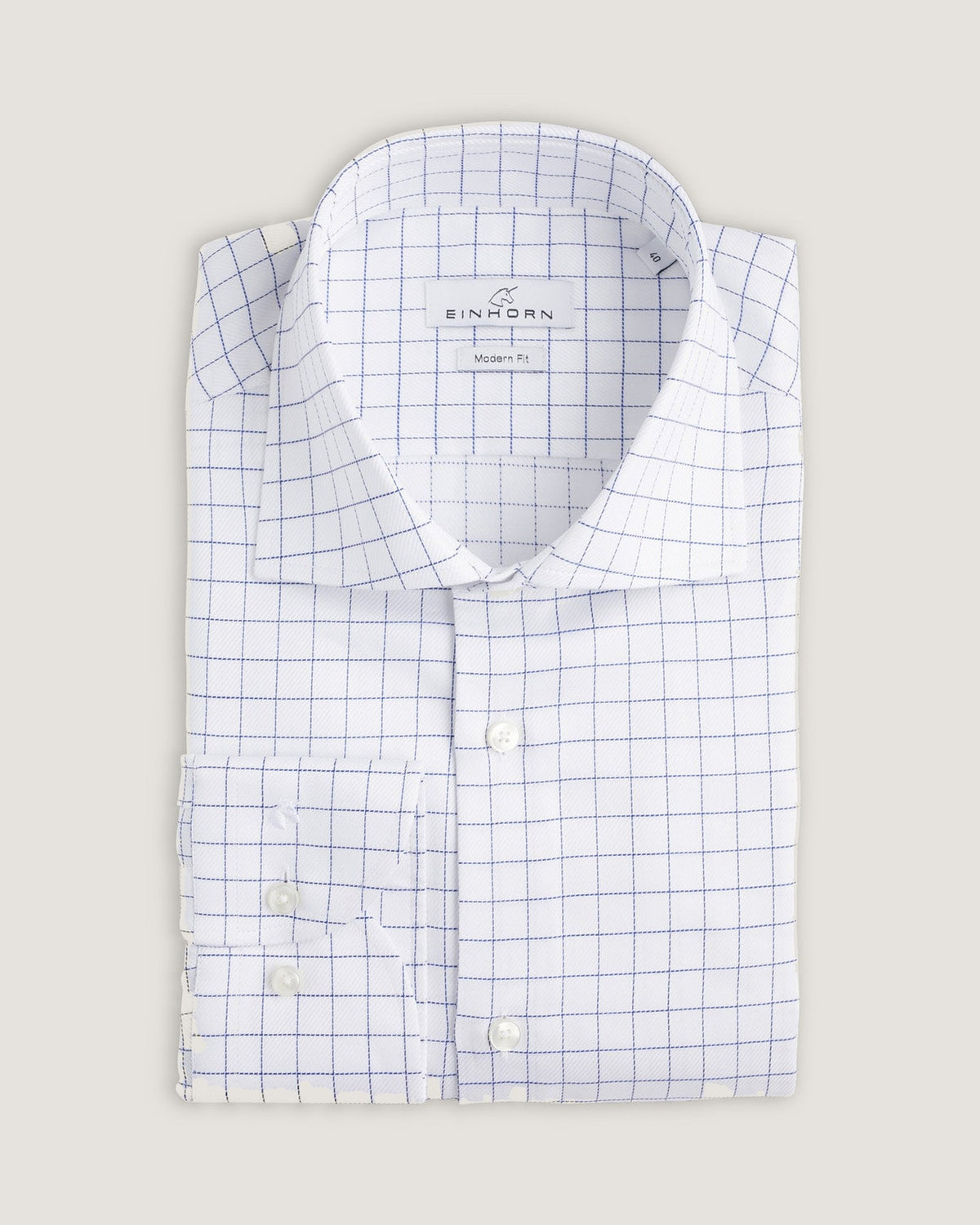 Das Einhorn Hemd Modern Fit Twill Weiß Karo vereint klare Linien mit eleganter Struktur.